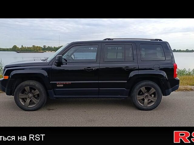 Черный Джип Патриот, объемом двигателя 2.4 л и пробегом 93 тыс. км за 12000 $, фото 7 на Automoto.ua