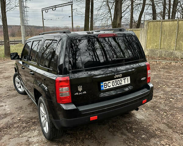 Черный Джип Патриот, объемом двигателя 2.36 л и пробегом 32 тыс. км за 11200 $, фото 11 на Automoto.ua