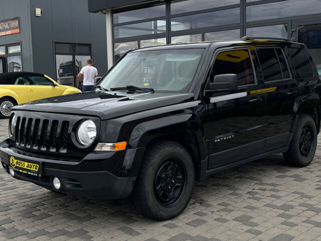 Черный Джип Патриот, объемом двигателя 2.4 л и пробегом 200 тыс. км за 9800 $, фото 2 на Automoto.ua