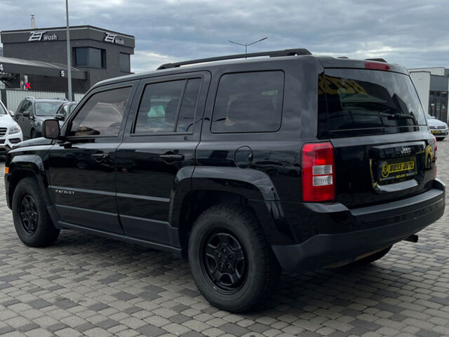 Черный Джип Патриот, объемом двигателя 2.4 л и пробегом 200 тыс. км за 9800 $, фото 4 на Automoto.ua
