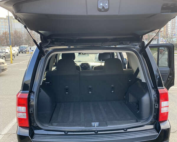 Черный Джип Патриот, объемом двигателя 2.36 л и пробегом 99 тыс. км за 11500 $, фото 13 на Automoto.ua