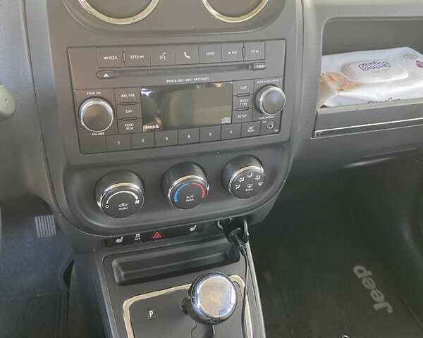 Черный Джип Патриот, объемом двигателя 2.36 л и пробегом 99 тыс. км за 11500 $, фото 14 на Automoto.ua