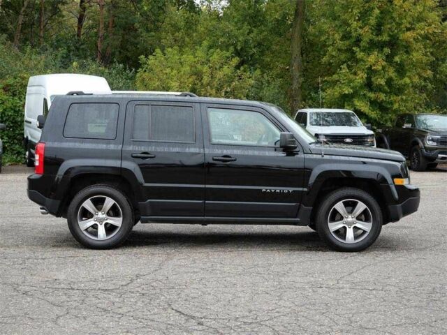 Черный Джип Патриот, объемом двигателя 2.4 л и пробегом 54 тыс. км за 4100 $, фото 5 на Automoto.ua