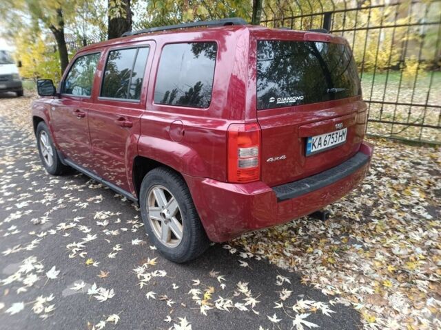 Красный Джип Патриот, объемом двигателя 2.4 л и пробегом 290 тыс. км за 7200 $, фото 1 на Automoto.ua