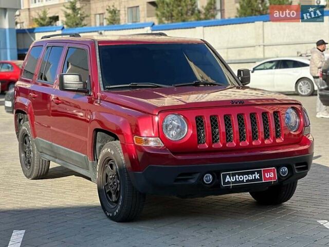 Червоний Джип Patriot, об'ємом двигуна 2.4 л та пробігом 181 тис. км за 8440 $, фото 2 на Automoto.ua