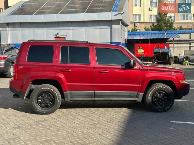 Червоний Джип Patriot, об'ємом двигуна 2.4 л та пробігом 181 тис. км за 8440 $, фото 4 на Automoto.ua