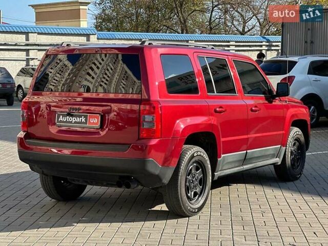 Червоний Джип Patriot, об'ємом двигуна 2.4 л та пробігом 181 тис. км за 8440 $, фото 5 на Automoto.ua