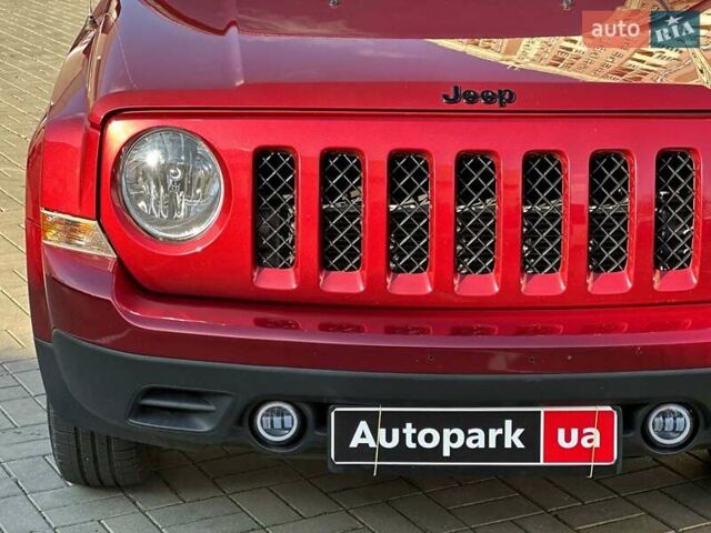 Червоний Джип Patriot, об'ємом двигуна 2.4 л та пробігом 181 тис. км за 8440 $, фото 3 на Automoto.ua