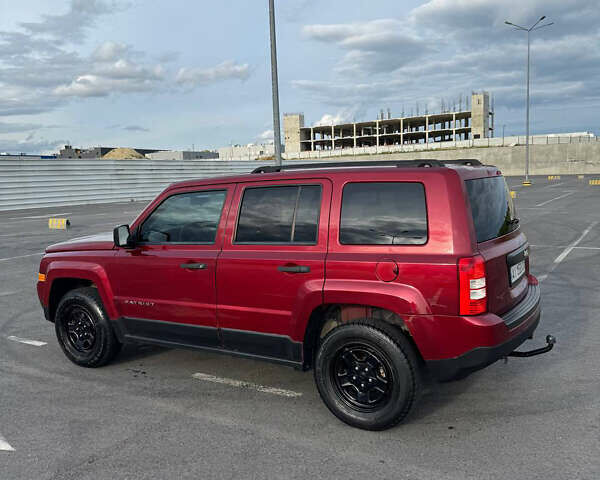 Красный Джип Патриот, объемом двигателя 2.36 л и пробегом 150 тыс. км за 8300 $, фото 3 на Automoto.ua