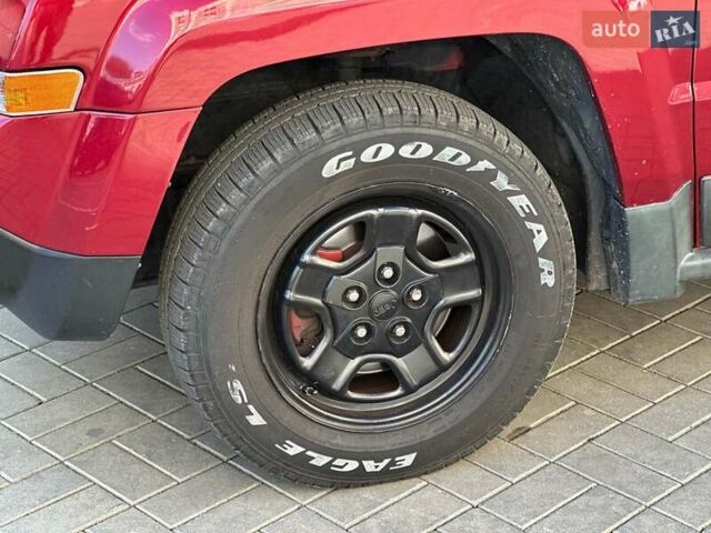 Червоний Джип Patriot, об'ємом двигуна 2.4 л та пробігом 181 тис. км за 8440 $, фото 10 на Automoto.ua