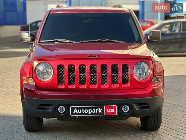Червоний Джип Patriot, об'ємом двигуна 2.4 л та пробігом 181 тис. км за 8440 $, фото 1 на Automoto.ua