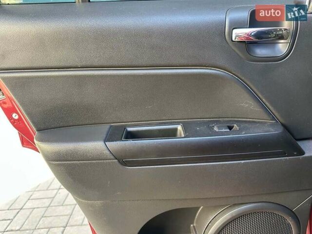 Червоний Джип Patriot, об'ємом двигуна 2.4 л та пробігом 181 тис. км за 8440 $, фото 12 на Automoto.ua