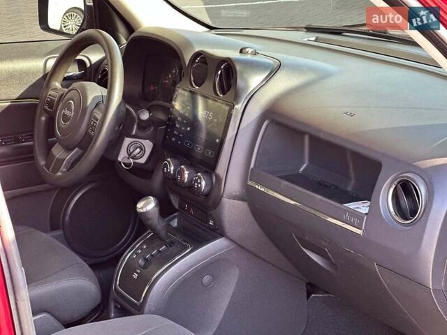 Червоний Джип Patriot, об'ємом двигуна 2.4 л та пробігом 181 тис. км за 8440 $, фото 16 на Automoto.ua