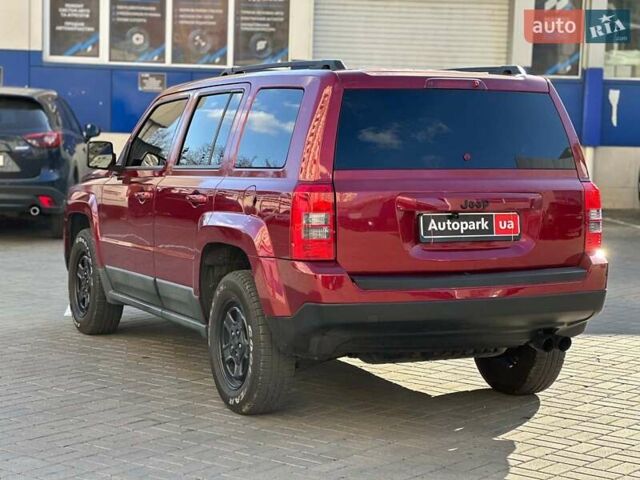 Червоний Джип Patriot, об'ємом двигуна 2.4 л та пробігом 181 тис. км за 8440 $, фото 7 на Automoto.ua