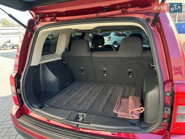 Червоний Джип Patriot, об'ємом двигуна 2.4 л та пробігом 181 тис. км за 8440 $, фото 13 на Automoto.ua