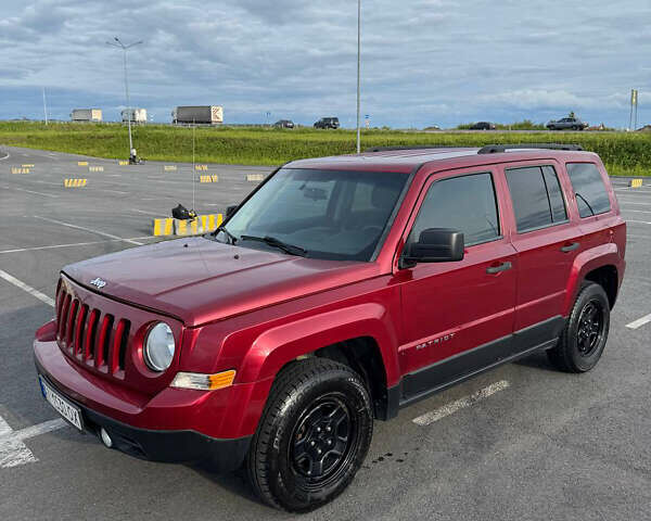 Красный Джип Патриот, объемом двигателя 2.36 л и пробегом 150 тыс. км за 8300 $, фото 7 на Automoto.ua