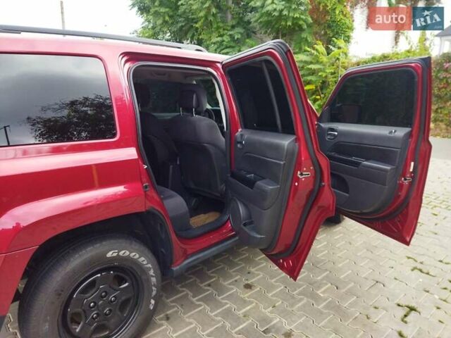 Красный Джип Патриот, объемом двигателя 2.36 л и пробегом 180 тыс. км за 8800 $, фото 2 на Automoto.ua