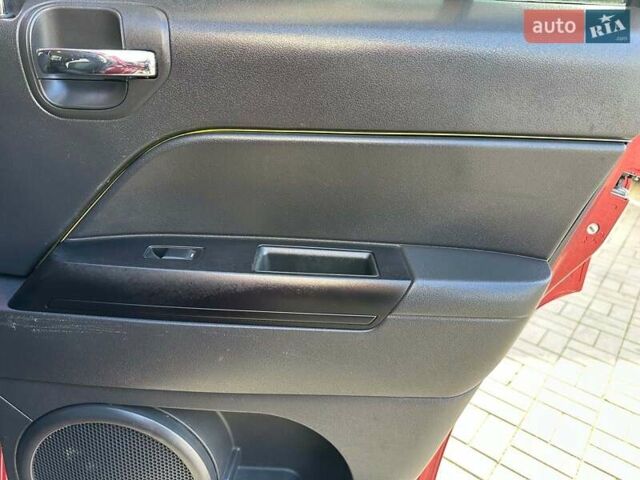 Червоний Джип Patriot, об'ємом двигуна 2.4 л та пробігом 181 тис. км за 8440 $, фото 15 на Automoto.ua