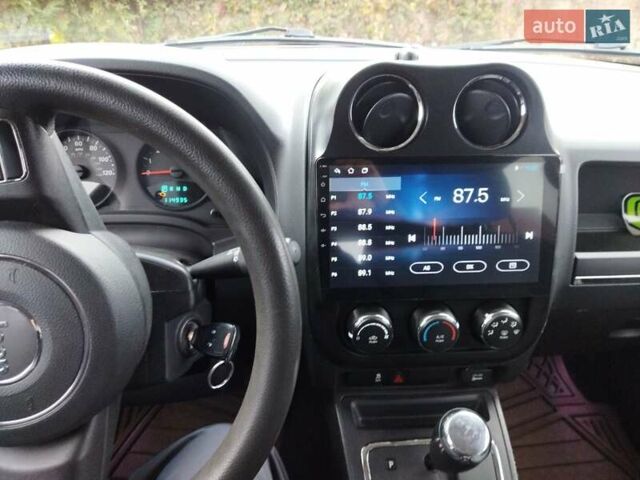 Красный Джип Патриот, объемом двигателя 2.36 л и пробегом 180 тыс. км за 8800 $, фото 11 на Automoto.ua