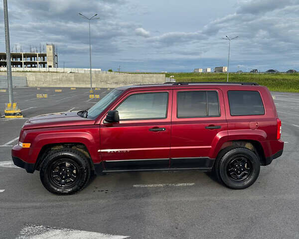 Красный Джип Патриот, объемом двигателя 2.36 л и пробегом 150 тыс. км за 8300 $, фото 4 на Automoto.ua