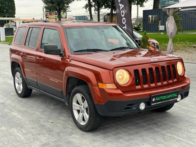 Красный Джип Патриот, объемом двигателя 2.4 л и пробегом 250 тыс. км за 8690 $, фото 4 на Automoto.ua