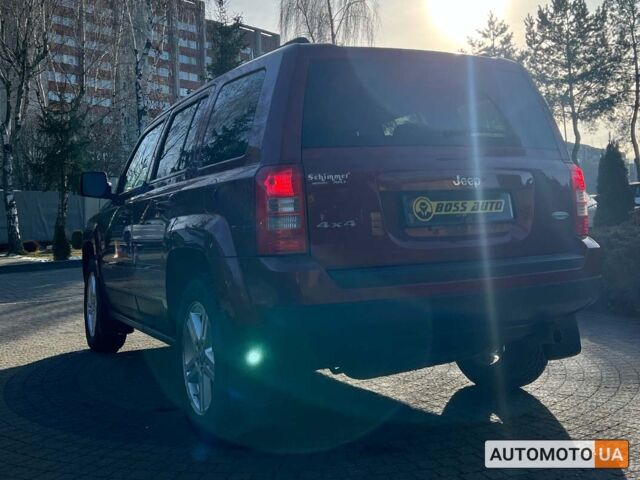 Красный Джип Патриот, объемом двигателя 2.4 л и пробегом 129 тыс. км за 9400 $, фото 4 на Automoto.ua