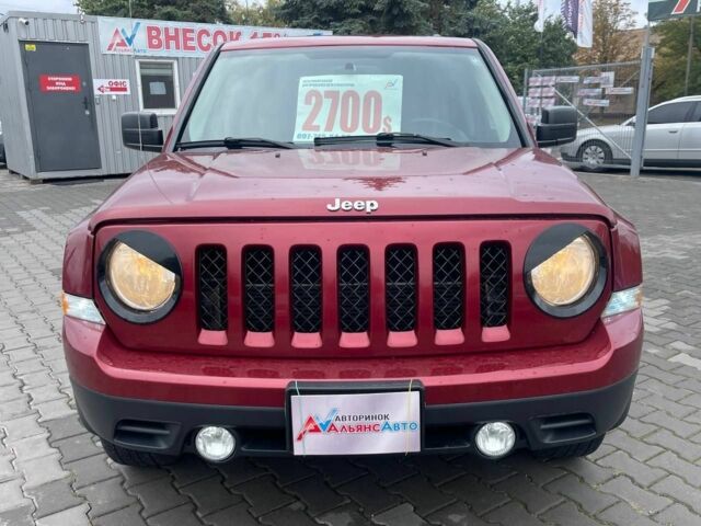 Красный Джип Патриот, объемом двигателя 2.4 л и пробегом 160 тыс. км за 8999 $, фото 1 на Automoto.ua