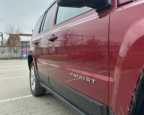 Червоний Джип Patriot, об'ємом двигуна 2.36 л та пробігом 213 тис. км за 7777 $, фото 14 на Automoto.ua