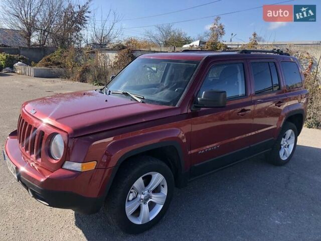 Красный Джип Патриот, объемом двигателя 2.4 л и пробегом 208 тыс. км за 9500 $, фото 3 на Automoto.ua