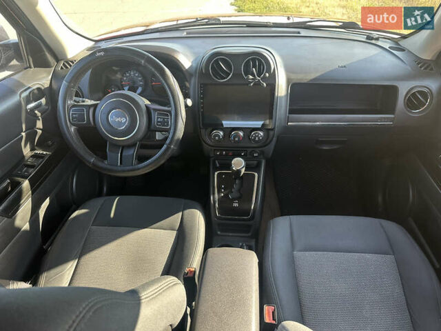 Красный Джип Патриот, объемом двигателя 2.36 л и пробегом 240 тыс. км за 8500 $, фото 18 на Automoto.ua