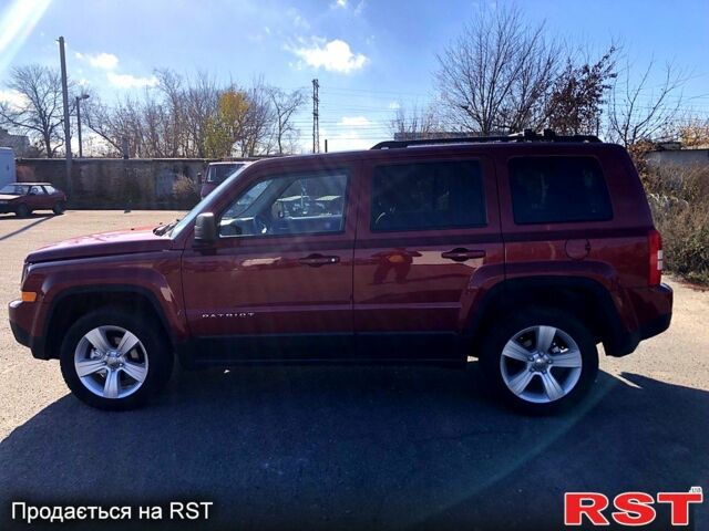 Красный Джип Патриот, объемом двигателя 2.4 л и пробегом 205 тыс. км за 9000 $, фото 7 на Automoto.ua