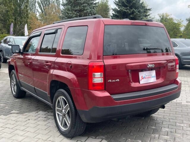 Красный Джип Патриот, объемом двигателя 2.4 л и пробегом 160 тыс. км за 8999 $, фото 4 на Automoto.ua