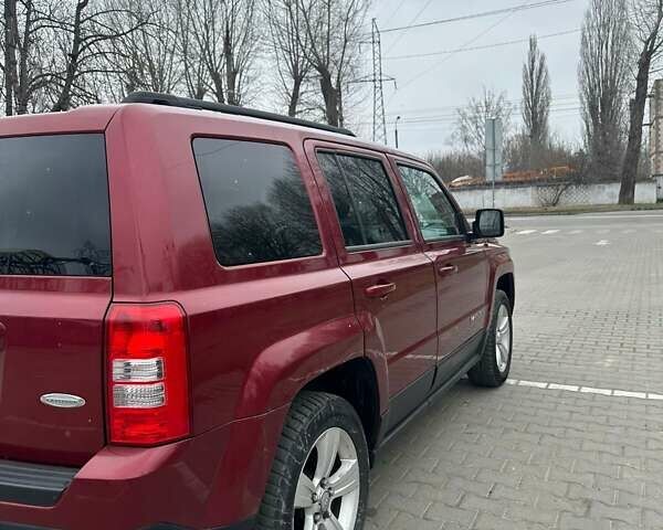 Червоний Джип Patriot, об'ємом двигуна 2.36 л та пробігом 213 тис. км за 7777 $, фото 7 на Automoto.ua