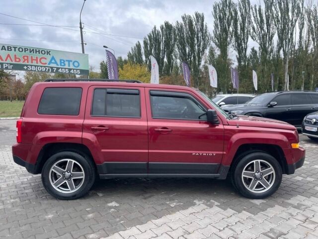 Красный Джип Патриот, объемом двигателя 2.4 л и пробегом 160 тыс. км за 8999 $, фото 7 на Automoto.ua