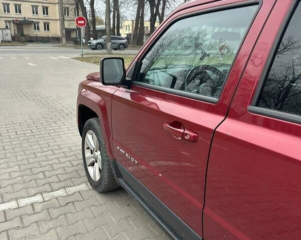 Червоний Джип Patriot, об'ємом двигуна 2.36 л та пробігом 213 тис. км за 7777 $, фото 6 на Automoto.ua