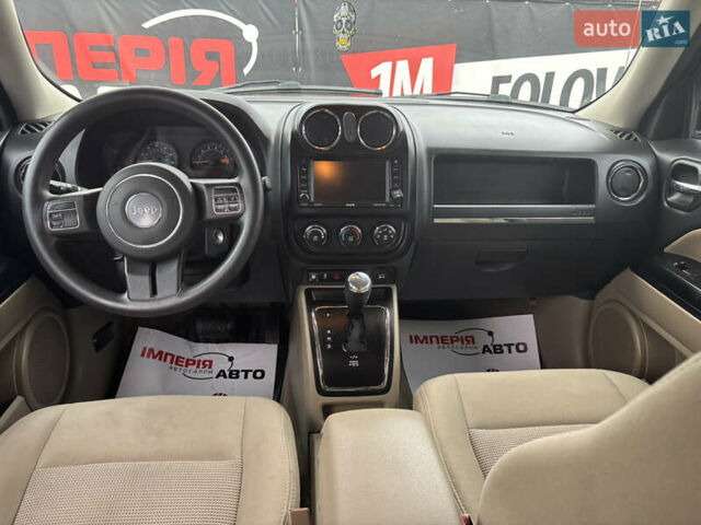 Красный Джип Патриот, объемом двигателя 2.36 л и пробегом 110 тыс. км за 9000 $, фото 6 на Automoto.ua