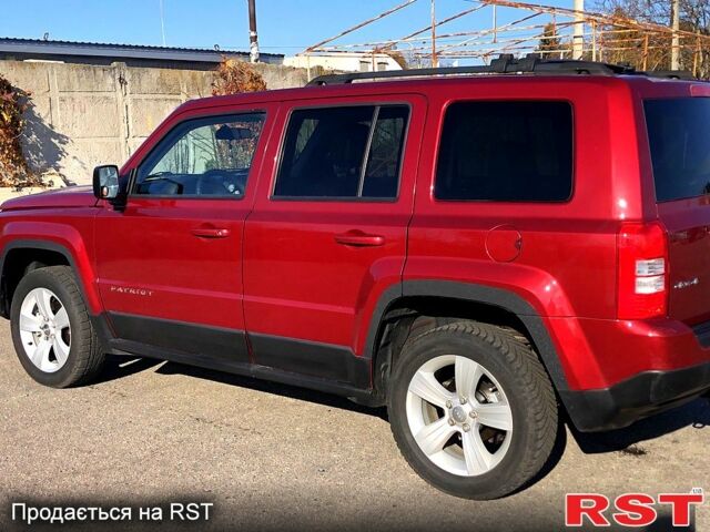 Красный Джип Патриот, объемом двигателя 2.4 л и пробегом 205 тыс. км за 9000 $, фото 3 на Automoto.ua