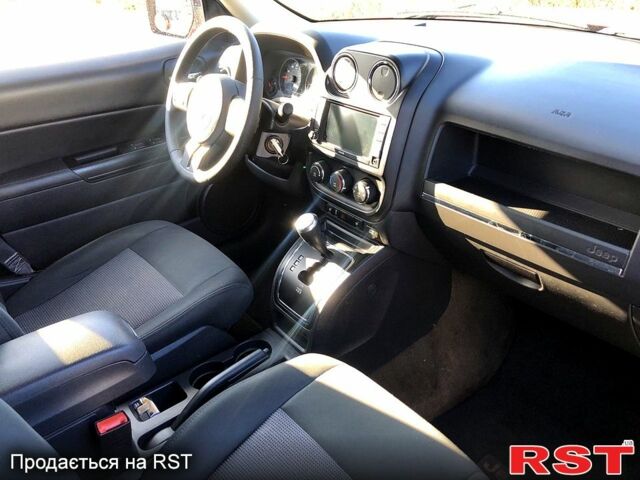 Красный Джип Патриот, объемом двигателя 2.4 л и пробегом 205 тыс. км за 9000 $, фото 8 на Automoto.ua