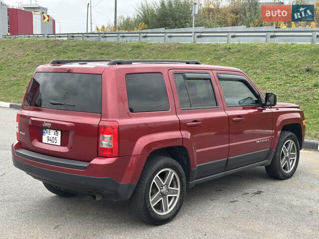 Красный Джип Патриот, объемом двигателя 2.36 л и пробегом 110 тыс. км за 9000 $, фото 5 на Automoto.ua