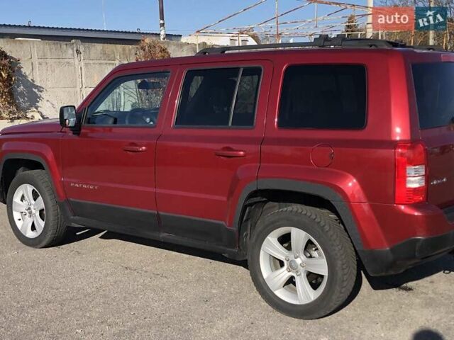 Красный Джип Патриот, объемом двигателя 2.4 л и пробегом 208 тыс. км за 9500 $, фото 2 на Automoto.ua