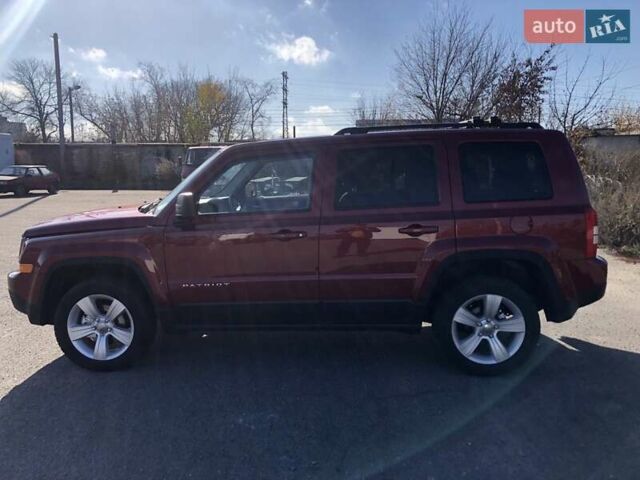 Красный Джип Патриот, объемом двигателя 2.4 л и пробегом 208 тыс. км за 9500 $, фото 6 на Automoto.ua