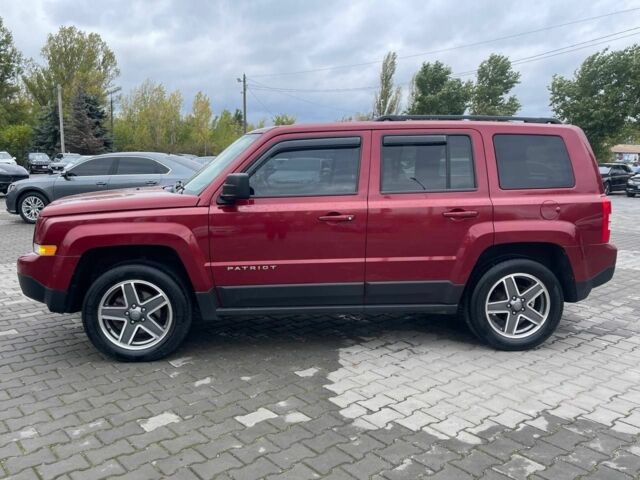 Красный Джип Патриот, объемом двигателя 2.4 л и пробегом 160 тыс. км за 8999 $, фото 3 на Automoto.ua