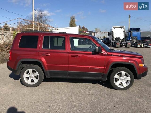 Красный Джип Патриот, объемом двигателя 2.4 л и пробегом 208 тыс. км за 9500 $, фото 5 на Automoto.ua