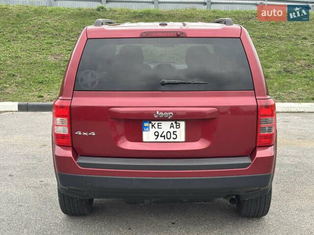 Красный Джип Патриот, объемом двигателя 2.36 л и пробегом 110 тыс. км за 9000 $, фото 4 на Automoto.ua