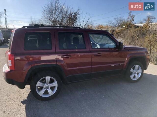Красный Джип Патриот, объемом двигателя 2.4 л и пробегом 208 тыс. км за 9500 $, фото 7 на Automoto.ua