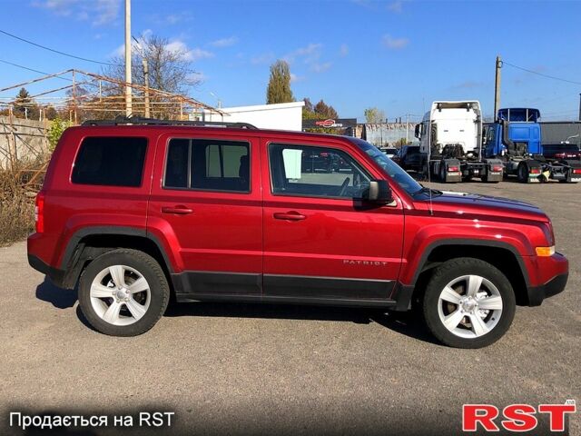 Красный Джип Патриот, объемом двигателя 2.4 л и пробегом 205 тыс. км за 9000 $, фото 5 на Automoto.ua