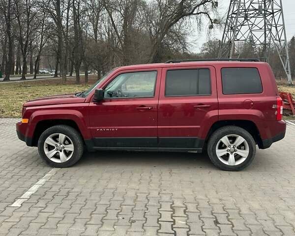 Червоний Джип Patriot, об'ємом двигуна 2.36 л та пробігом 213 тис. км за 7777 $, фото 5 на Automoto.ua