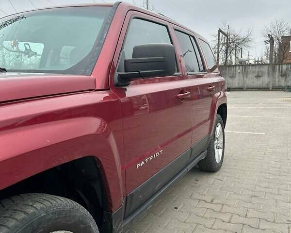 Червоний Джип Patriot, об'ємом двигуна 2.36 л та пробігом 213 тис. км за 7777 $, фото 8 на Automoto.ua