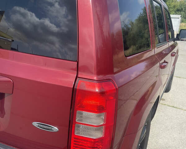 Красный Джип Патриот, объемом двигателя 2 л и пробегом 197 тыс. км за 9700 $, фото 8 на Automoto.ua