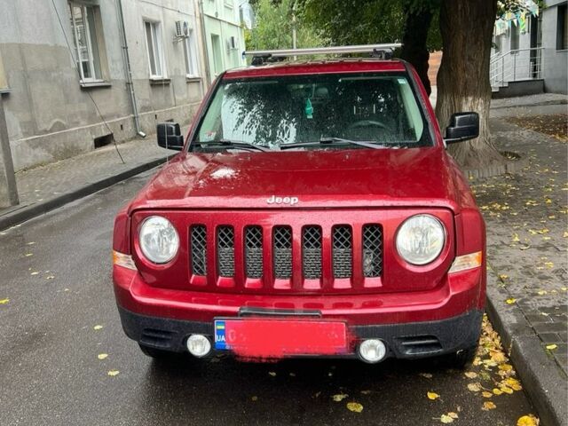 Красный Джип Патриот, объемом двигателя 2.4 л и пробегом 149 тыс. км за 8900 $, фото 1 на Automoto.ua